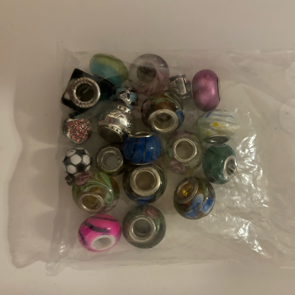 Assorted beads and charms for pandora or chamilia bracelet